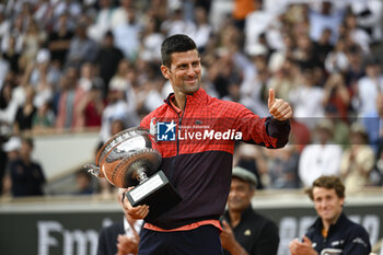 2023-06-11 - Novak Djokovic with the trophy ("La Coupe des Mousquetaires") during the French Open, Grand Slam tennis tournament on June 11, 2023 at Roland Garros stadium in Paris, France. Photo Victor / DPPI - TENNIS - ROLAND GARROS 2023 - WEEK 2 - INTERNATIONALS - TENNIS