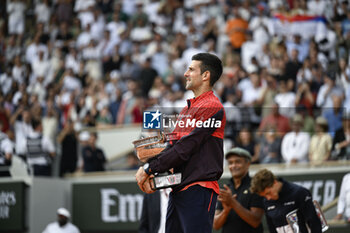 2023-06-11 - Novak Djokovic with the trophy ("La Coupe des Mousquetaires") during the French Open, Grand Slam tennis tournament on June 11, 2023 at Roland Garros stadium in Paris, France. Photo Victor / DPPI - TENNIS - ROLAND GARROS 2023 - WEEK 2 - INTERNATIONALS - TENNIS