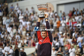 2023-06-11 - Novak Djokovic of Serbia with the trophy ("La Coupe des Mousquetaires") during the French Open final, Grand Slam tennis tournament on June 11, 2023 at Roland Garros stadium in Paris, France. Photo Victor / DPPI - TENNIS - ROLAND GARROS 2023 - WEEK 2 - INTERNATIONALS - TENNIS
