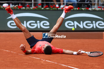 2023-06-11 - Novak Djokovic of Serbia celebrates winining the Men's Singles Final against Casper Ruud of Norway at the French Open 2023, Roland-Garros 2023, Grand Slam tennis tournament, on June 11, 2023 at Stade Roland-Garros in Paris, France - TENNIS - ROLAND GARROS 2023 - WEEK 2 - INTERNATIONALS - TENNIS