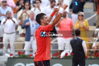 2023-06-11 - Novak Djokovic of Serbia celebrates winining the Men's Singles Final against Casper Ruud of Norway at the French Open 2023, Roland-Garros 2023, Grand Slam tennis tournament, on June 11, 2023 at Stade Roland-Garros in Paris, France - TENNIS - ROLAND GARROS 2023 - WEEK 2 - INTERNATIONALS - TENNIS