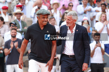 2023-06-11 - Trophy presenter Yannick Noah, President of French Tennis Federation FFT Gilles Moretton during the trophy ceremony following the Men's Singles Final at the French Open 2023, Roland-Garros 2023, Grand Slam tennis tournament, on June 11, 2023 at Stade Roland-Garros in Paris, France - TENNIS - ROLAND GARROS 2023 - WEEK 2 - INTERNATIONALS - TENNIS
