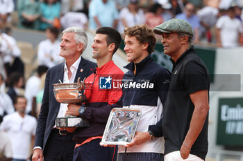 2023-06-11 - President of French Tennis Federation FFT Gilles Moretton, Winner Novak Djokovic of Serbia, Finalist Casper Ruud of Norway, Trophy presenter Yannick Noah during the trophy ceremony following the Men's Singles Final at the French Open 2023, Roland-Garros 2023, Grand Slam tennis tournament, on June 11, 2023 at Stade Roland-Garros in Paris, France - TENNIS - ROLAND GARROS 2023 - WEEK 2 - INTERNATIONALS - TENNIS
