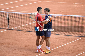 2023-06-11 - Novak Djokovic and Casper Ruud during the French Open final, Grand Slam tennis tournament on June 11, 2023 at Roland Garros stadium in Paris, France. Photo Victor Joly / DPPI - TENNIS - ROLAND GARROS 2023 - WEEK 2 - INTERNATIONALS - TENNIS
