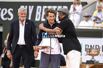 2023-06-11 - Yannick Noah and Casper Ruud during the French Open final, Grand Slam tennis tournament on June 11, 2023 at Roland Garros stadium in Paris, France. Photo Victor Joly / DPPI - TENNIS - ROLAND GARROS 2023 - WEEK 2 - INTERNATIONALS - TENNIS