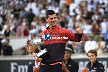 2023-06-11 - Novak Djokovic with the trophy ("La Coupe des Mousquetaires") during the French Open final, Grand Slam tennis tournament on June 11, 2023 at Roland Garros stadium in Paris, France. Photo Victor Joly / DPPI - TENNIS - ROLAND GARROS 2023 - WEEK 2 - INTERNATIONALS - TENNIS