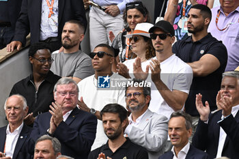 2023-06-11 - Zlatan Ibrahimovic and Kylian Mbappe during the French Open final, Grand Slam tennis tournament on June 11, 2023 at Roland Garros stadium in Paris, France. Photo Victor Joly / DPPI - TENNIS - ROLAND GARROS 2023 - WEEK 2 - INTERNATIONALS - TENNIS