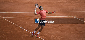 2023-06-11 - Novak Djokovic serves during the French Open final, Grand Slam tennis tournament on June 11, 2023 at Roland Garros stadium in Paris, France. Photo Victor Joly / DPPI - TENNIS - ROLAND GARROS 2023 - WEEK 2 - INTERNATIONALS - TENNIS