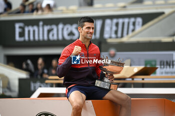 2023-06-11 - Novak Djokovic with the trophy ("La Coupe des Mousquetaires") during the French Open final, Grand Slam tennis tournament on June 11, 2023 at Roland Garros stadium in Paris, France. Photo Victor Joly / DPPI - TENNIS - ROLAND GARROS 2023 - WEEK 2 - INTERNATIONALS - TENNIS