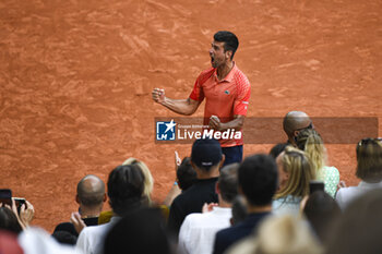 2023-06-11 - Novak Djokovic celebrates his victory during the French Open final, Grand Slam tennis tournament on June 11, 2023 at Roland Garros stadium in Paris, France. Photo Victor Joly / DPPI - TENNIS - ROLAND GARROS 2023 - WEEK 2 - INTERNATIONALS - TENNIS