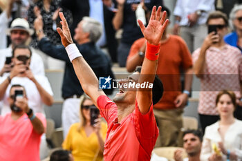 2023-06-11 - Novak DJOKOVIC of Serbia celebrates his victory during the fifteenth day of Roland-Garros 2023, Grand Slam tennis tournament, on June 11, 2023 at Roland-Garros stadium in Paris, France - TENNIS - ROLAND GARROS 2023 - WEEK 2 - INTERNATIONALS - TENNIS