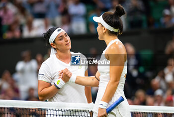2023-07-08 - Ons Jabeur of Tunisia & Bianca Andreescu of Canada in action during the third round of the 2023 Wimbledon Championships on July 8, 2023 at All England Lawn Tennis & Croquet Club in Wimbledon, England - TENNIS - WIMBLEDON 2023 - INTERNATIONALS - TENNIS