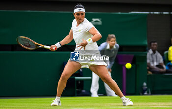 2023-07-08 - Ons Jabeur of Tunisia in action during the third round of the 2023 Wimbledon Championships on July 8, 2023 at All England Lawn Tennis & Croquet Club in Wimbledon, England - TENNIS - WIMBLEDON 2023 - INTERNATIONALS - TENNIS