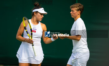 2023-07-08 - Demi Schuurs of the Netherlands & Desirae Krawczyk of the United States in action during the first round of doubles at the 2023 Wimbledon Championships on July 8, 2023 at All England Lawn Tennis & Croquet Club in Wimbledon, England - TENNIS - WIMBLEDON 2023 - INTERNATIONALS - TENNIS