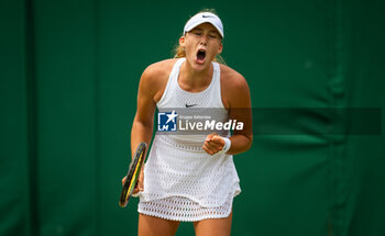 2023-07-09 - Mirra Andreeva of Russia in action against Anastasia Potapova of Russia during the fourth round of the 2023 Wimbledon Championships on July 9, 2023 at All England Lawn Tennis & Croquet Club in Wimbledon, England - TENNIS - WIMBLEDON 2023 - INTERNATIONALS - TENNIS