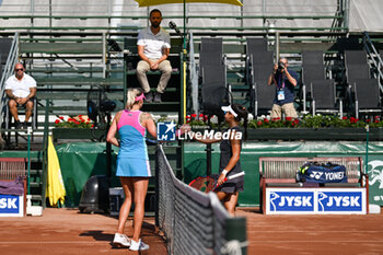 2023-07-20 - Kateryna Baindi (UKR) and Amarissa Toth after the match of the fourth day main draw match of WTA250 Hungarian Gran Prix Tennis on July 20th, 2023 at Romai Teniszakademia , Budapest, Hungary - WTA 250 - HUNGARIAN GRAND PRIX - INTERNATIONALS - TENNIS