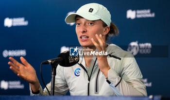 2023-08-09 - Iga Swiatek of Poland talks to the media after the second round of the 2023 Omnium Banque Nationale, WTA 1000 tennis tournament on August 9, 2023 in Montreal, Canada - TENNIS - WTA - OMNIUM BANQUE NATIONALE 2023 - INTERNATIONALS - TENNIS