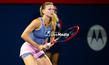 2023-08-09 - Camila Giorgi of Italy in action against Petra Kvitova of the Czech Republic during the second round of the 2023 Omnium Banque Nationale, WTA 1000 tennis tournament on August 9, 2023 in Montreal, Canada - TENNIS - WTA - OMNIUM BANQUE NATIONALE 2023 - INTERNATIONALS - TENNIS