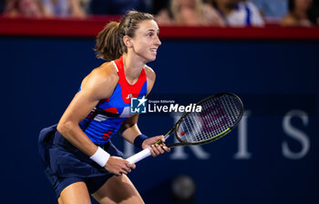 2023-08-09 - Petra Martic of Croatia in action against Aryna Sabalenka of Belarus during the second round of the 2023 Omnium Banque Nationale, WTA 1000 tennis tournament on August 9, 2023 in Montreal, Canada - TENNIS - WTA - OMNIUM BANQUE NATIONALE 2023 - INTERNATIONALS - TENNIS