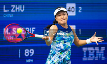 2023-08-28 - Lin Zhu of China in action during the first round of the 2023 US Open Tennis Championships, Grand Slam tennis tournament on August 28, 2023 at USTA National Tennis Center in New York, United States - TENNIS - US OPEN 2023 - INTERNATIONALS - TENNIS