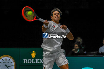 2023-09-12 - Cristian Garin (CHI) hits the ball with his forehand during Davis Cup 2023 Group A match between Leo Borg (SWE) in Bologna 12/09/23 at the Unipol Arena - DAVIS CUP - SWEDEN VS CHILE - INTERNATIONALS - TENNIS
