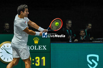 2023-09-12 - Cristian Garin (CHI) hits the ball with his backhand during Davis Cup 2023 Group A match between Leo Borg (SWE) in Bologna 12/09/23 at the Unipol Arena - DAVIS CUP - SWEDEN VS CHILE - INTERNATIONALS - TENNIS