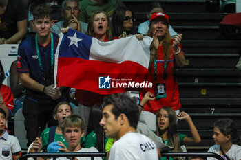 2023-09-12 - Supporters of Chile celebrates after winning the point during Davis Cup 2023 Group A match between Leo Borg (SWE) in Bologna 12/09/23 at the Unipol Arena - DAVIS CUP - SWEDEN VS CHILE - INTERNATIONALS - TENNIS
