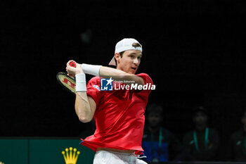 2023-09-12 - Nicolas Jarry (CHI) hits the ball with his backhand during Davis Cup 2023 Group A match between Elias Ymer (SWE) in Bologna 12/09/23 at the Unipol Arena - DAVIS CUP - SWEDEN VS CHILE - INTERNATIONALS - TENNIS