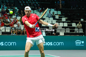 2023-09-12 - Nicolas Jarry (CHI) hits the ball with his backhand during Davis Cup 2023 Group A match between Elias Ymer (SWE) in Bologna 12/09/23 at the Unipol Arena - DAVIS CUP - SWEDEN VS CHILE - INTERNATIONALS - TENNIS