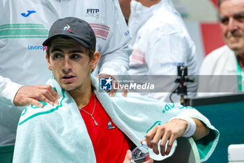 2023-09-13 - Matteo Arnaldi (ITA) during warm up before the match at Davis Cup 2023 Group A match at the Unipol Arena in Bologna on 13/09/23 - DAVIS CUP - CANADA VS ITALY - INTERNATIONALS - TENNIS