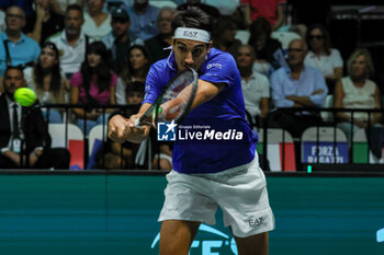 2023-09-13 - Lorenzo Sonego (ITA) hits the ball with his backhand during Davis Cup 2023 Group A match between Alexis Galarneau (CAN) at the Unipol Arena in Bologna on13/09/23 - DAVIS CUP - CANADA VS ITALY - INTERNATIONALS - TENNIS