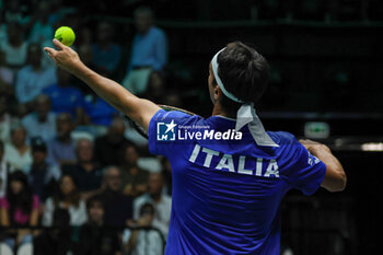 2023-09-13 - Lorenzo Sonego (ITA) serving ball during Davis Cup 2023 Group A match between Alexis Galarneau (CAN)at the Unipol Arena in Bologna on 13/09/23 - DAVIS CUP - CANADA VS ITALY - INTERNATIONALS - TENNIS