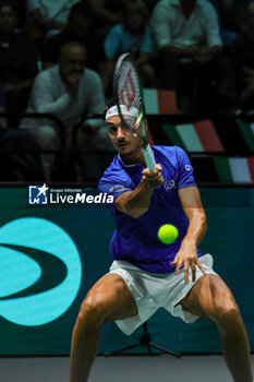 2023-09-13 - Lorenzo Sonego (ITA) hits the ball with his forehand during Davis Cup 2023 Group A match between Alexis Galarneau (CAN) at the Unipol Arena in Bologna on 13/09/23 - DAVIS CUP - CANADA VS ITALY - INTERNATIONALS - TENNIS