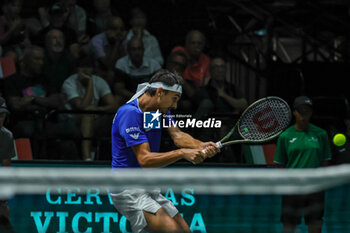 2023-09-13 - Lorenzo Sonego (ITA) hits the ball with his backhand during Davis Cup 2023 Group A match between Alexis Galarneau (CAN) at the Unipol Arena in Bologna on 13/09/23 - DAVIS CUP - CANADA VS ITALY - INTERNATIONALS - TENNIS