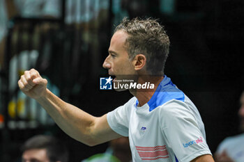 2023-09-13 - Filippo Volandri head coach of Italy National Team celebrates after winning the point during Davis Cup 2023 Group A match between Alexis Galarneau (CAN) at the Unipol Arena in Bologna on 13/09/23 - DAVIS CUP - CANADA VS ITALY - INTERNATIONALS - TENNIS