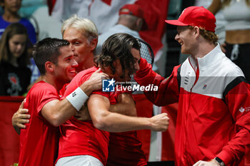 2023-09-13 - Canada National team celebrates after winning the match at Davis Cup 2023 Group A match between at the Unipol Arena in Bologna on 13/09/23 - DAVIS CUP - CANADA VS ITALY - INTERNATIONALS - TENNIS