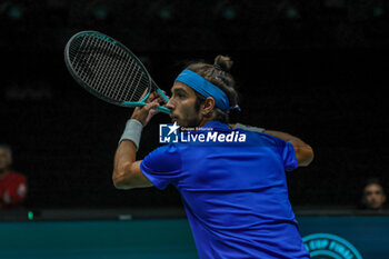 2023-09-13 - Lorenzo Musetti (ITA) hits the ball with his forehand during Davis Cup 2023 Group A match between Gabriel Diallo (CAN) at the Unipol Arena in Bologna on 13/09/23 - DAVIS CUP - CANADA VS ITALY - INTERNATIONALS - TENNIS