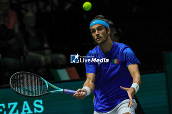 2023-09-13 - Lorenzo Musetti (ITA) hits the ball with his forehand during Davis Cup 2023 Group A match between Gabriel Diallo (CAN) at the Unipol Arena in Bologna on 13/09/23 - DAVIS CUP - CANADA VS ITALY - INTERNATIONALS - TENNIS