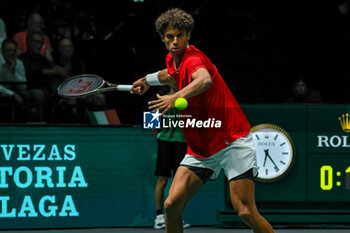 2023-09-13 - Gabriel Diallo (CAN) hits the ball with his forehand during Davis Cup 2023 Group A match between Lorenzo Musetti (ITA) at the Unipol Arena in Bologna on 13/09/23 - DAVIS CUP - CANADA VS ITALY - INTERNATIONALS - TENNIS