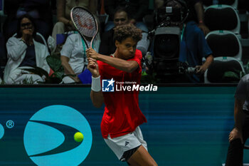 2023-09-13 - Gabriel Diallo (CAN)hits the ball with his backhand during Davis Cup 2023 Group A match between Lorenzo Musetti (ITA)at the Unipol Arena in Bologna on 13/09/23 - DAVIS CUP - CANADA VS ITALY - INTERNATIONALS - TENNIS