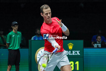 2023-09-14 - Vasek Pospisil (CAN) hits the ball with his forehand - DAVIS CUP - CANADA VS SWEDEN - INTERNATIONALS - TENNIS
