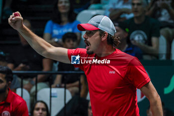 2023-09-14 - Frank Darcevic (CAN) celebrates after winning the point. - DAVIS CUP - CANADA VS SWEDEN - INTERNATIONALS - TENNIS