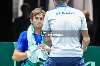 2023-09-15 - Matteo Arnaldi (ITA) during break at Davis Cup 2023 Group A match between Cristian Garin (CHI) at the Unipol Arena in Bologna on 15/09/23 - 2023 DAVIS CUP - ITALY VS CHILE - INTERNATIONALS - TENNIS