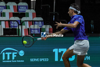 2023-09-15 - Lorenzo Sonego (ITA) hits the ball with his forehand during Davis Cup 2023 Group A match between Nicolas Jarry (CHI) at the Unipol Arena in Bologna on 15/09/23 - 2023 DAVIS CUP - ITALY VS CHILE - INTERNATIONALS - TENNIS
