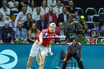 2023-09-15 - Nicolas Jarry (CHI) serving ball during Davis Cup 2023 Group A match between at the Unipol Arena in Bologna on 15/09/23 - 2023 DAVIS CUP - ITALY VS CHILE - INTERNATIONALS - TENNIS