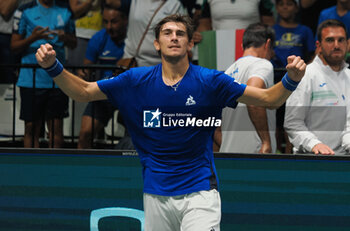 2023-09-17 - Matteo Arnaldi jubilates for the victory at end of the Italy vs Sweden - Finals group A match Matteo Arnaldi (ITA) vs. Leo Borg (SWE) at Unipol Arena - sport, tennis - September 17, 2023, Bologna, Italy - photo. c.b. - 2023 DAVIS CUP - ITALY VS SWEDEN - INTERNATIONALS - TENNIS