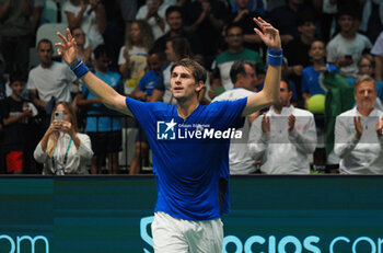 2023-09-17 - Matteo Arnaldi jubilates for the victory at end of the Italy vs Sweden - Finals group A match Matteo Arnaldi (ITA) vs. Leo Borg (SWE) at Unipol Arena - sport, tennis - September 17, 2023, Bologna, Italy - photo. c.b. - 2023 DAVIS CUP - ITALY VS SWEDEN - INTERNATIONALS - TENNIS