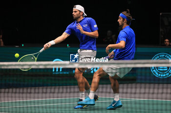 2023-09-17 - during the Italy vs Sweden - Davis Cup Finals group A double match between Simone Bolelli and Lorenzo Musetti (ITA) VS. Andre Goransson and Filip Bergevi at Unipol Arena - sport, tennis - September 17, 2023, Bologna, Italy - photo. c.b. - 2023 DAVIS CUP - ITALY VS SWEDEN - INTERNATIONALS - TENNIS