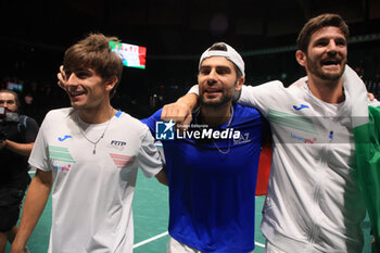 2023-09-17 - the italy’s team jubilates for qualification to Malaga Final 8 at the end of Italy vs Sweden - Davis Cup Finals group A double match between Simone Bolelli and Lorenzo Musetti (ITA) VS. Andre Goransson and Filip Bergevi at Unipol Arena - sport, tennis - September 17, 2023, Bologna, Italy - photo. c.b. - 2023 DAVIS CUP - ITALY VS SWEDEN - INTERNATIONALS - TENNIS