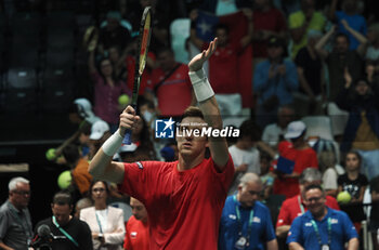 2023-09-16 - Nicolas Jarry celebrates at the end of the group A match of the Davis tennis cup final Canada vs Chile at Unipol arena, won 6-4 6-4 - Bologna, Italy, September 16, 2023 - photo c.b.the - 2023 DAVIS CUP - CANADA VS CHILE - INTERNATIONALS - TENNIS